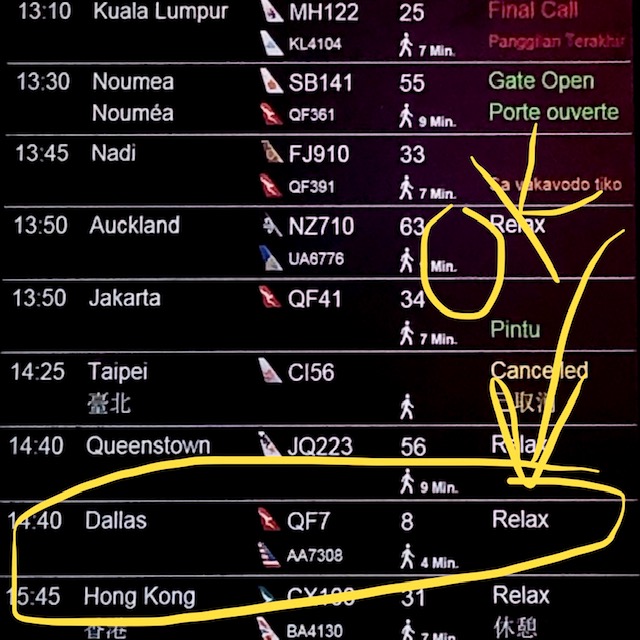 Sydney departure board saying "relax"